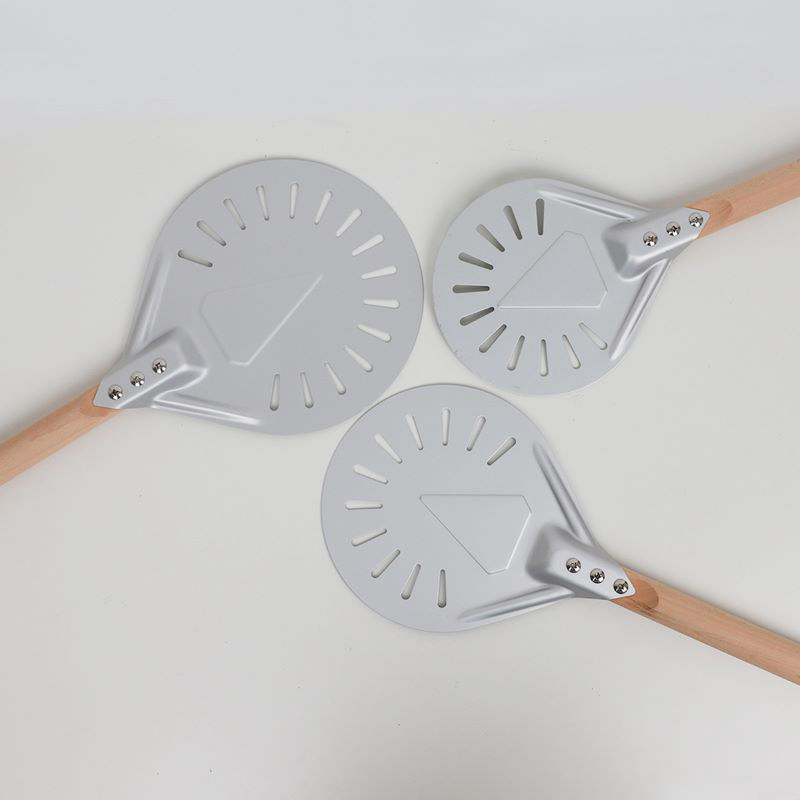 Perforated round pizza paddles.jpg